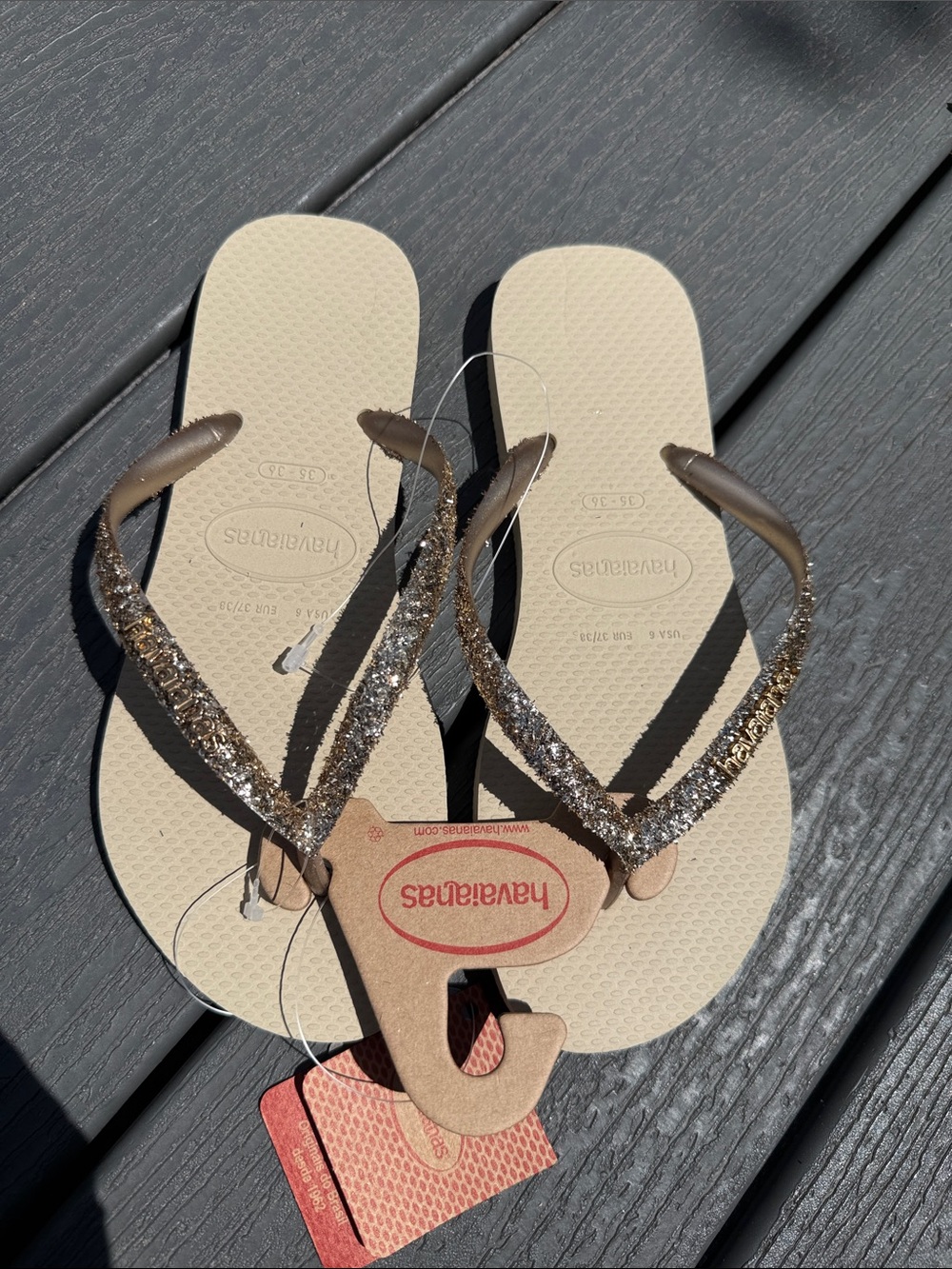 Havaianas Women’s Flip Flops - Beige Footbed with Gold Glitter Straps